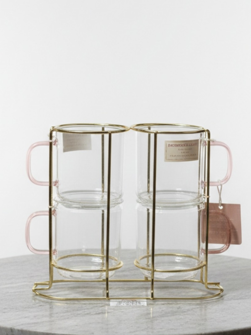 Set of 4 Clear Glass Mugs with Pink Handles and Gold Rack